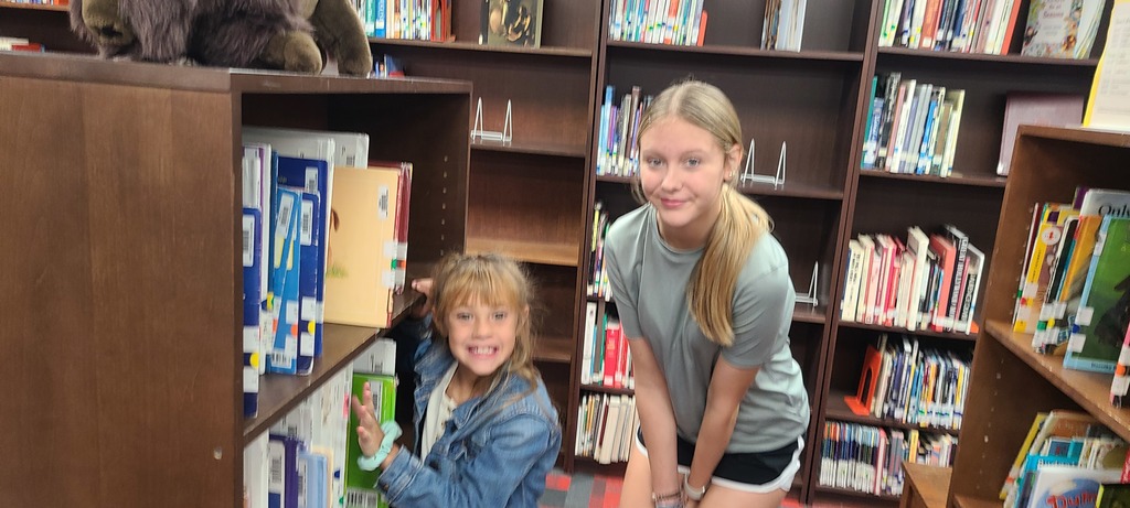 older students help younger students find books